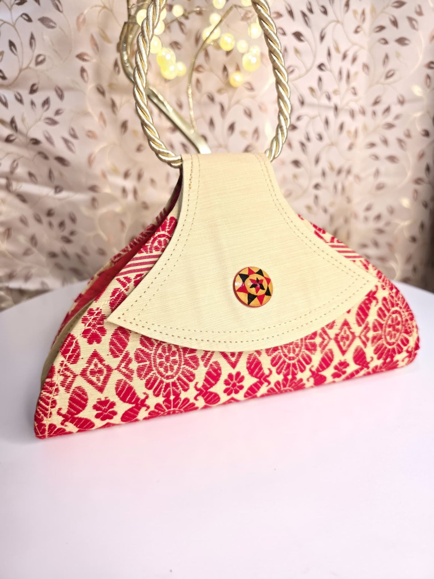 Traditional triangled japi clutch bag