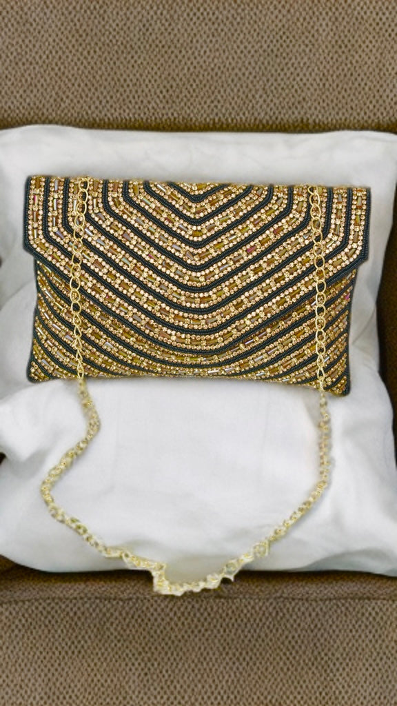 Party wear full stone embroidery golden with black clutch