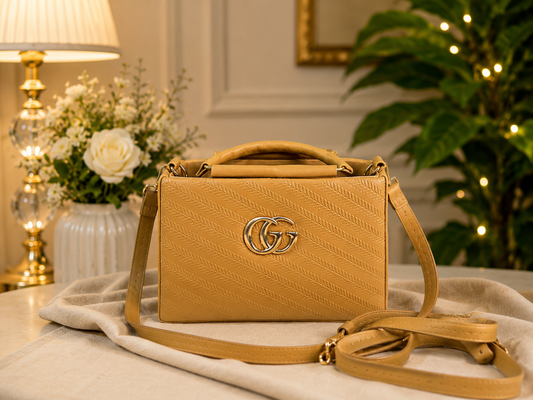 Chic Tan Chevron Quilted Handbag with Gold Interlocking Logo