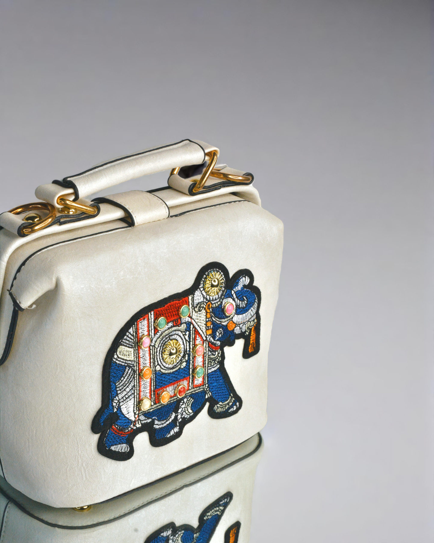 Elephant embroidery work white with black border handbag
