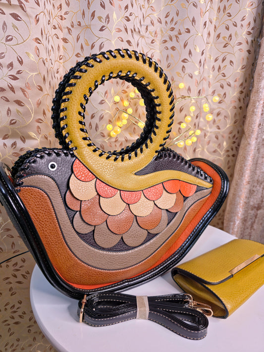 Bird Designer two compartment hand bag. Extra pouch inside