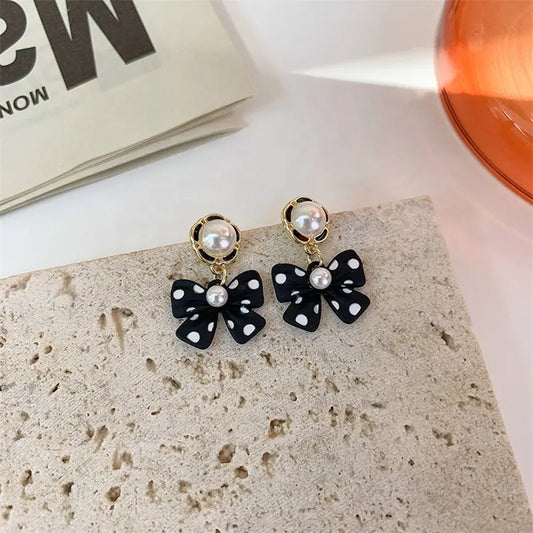 Chic Polka Dot Bow Earrings with Pearls - Stylish and Playful