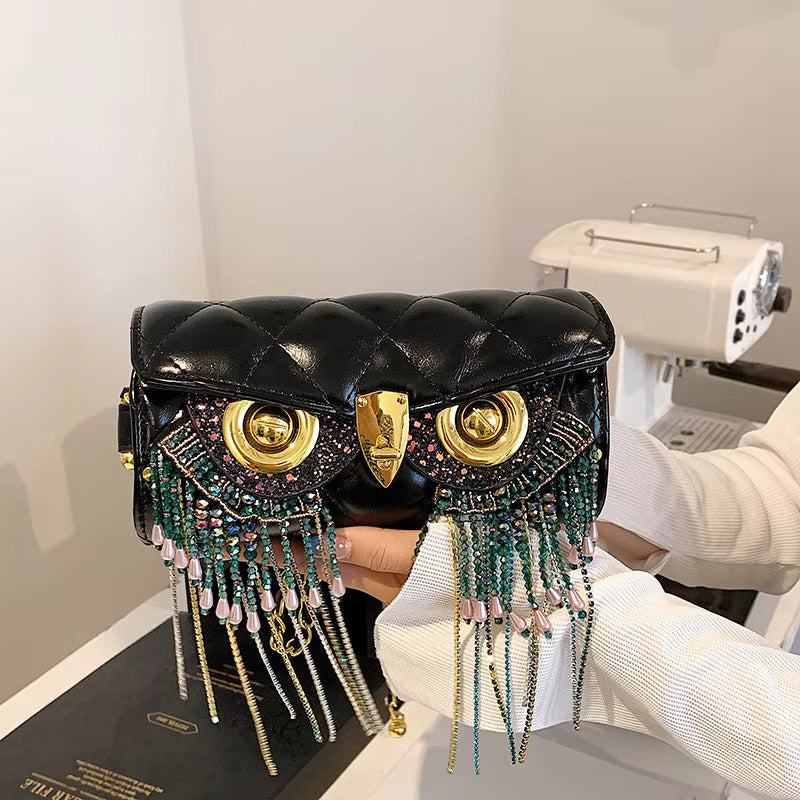 Designer stone work tessle owl face duffle bag