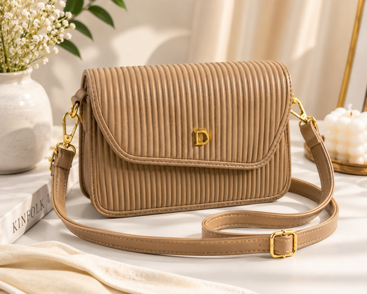 Elegant Nude Ribbed Crossbody Bag with Gold 'D' Clasp