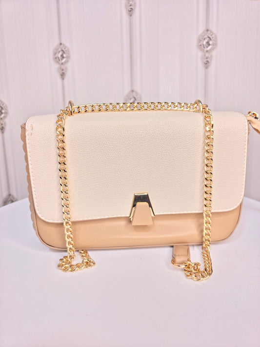 Stylish girl metallic sling handbag