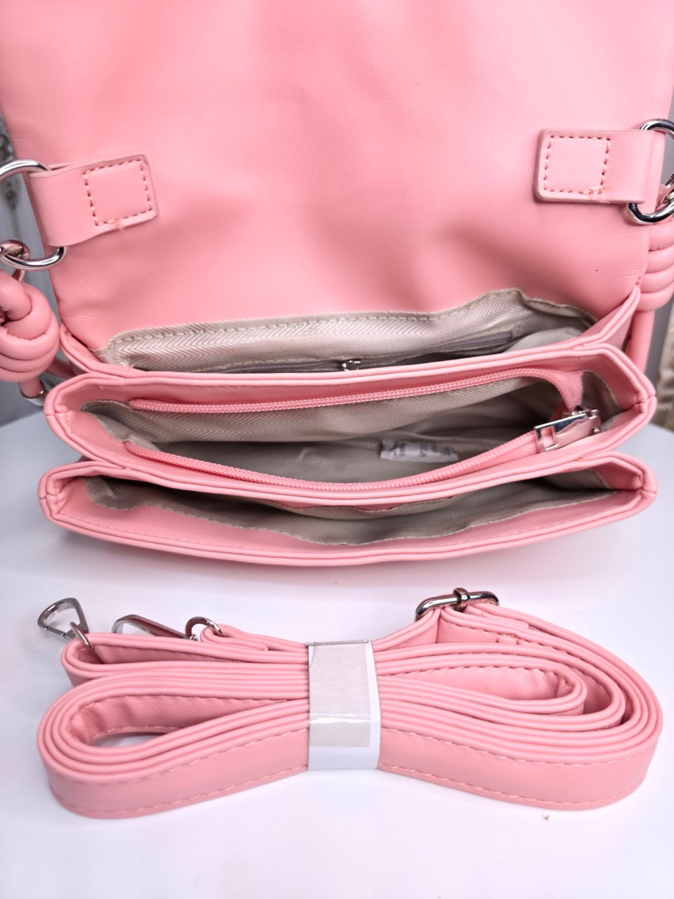 Soft leather peach bow bag with detachable sling