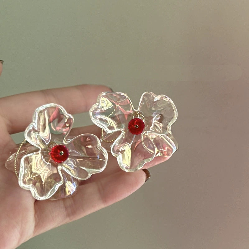 Transparent Floral Earrings with Red Gem Accents