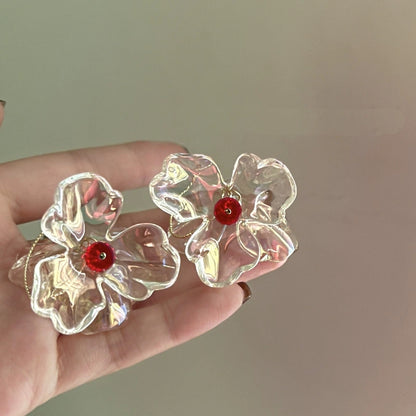 Transparent Floral Earrings with Red Gem Accents