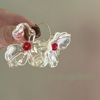 Transparent Floral Earrings with Red Gem Accents
