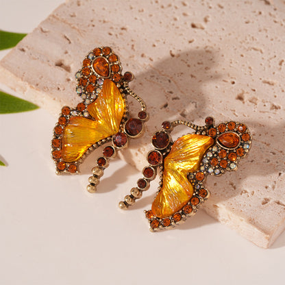 Golden Butterfly Statement Necklace with Amber Beads
