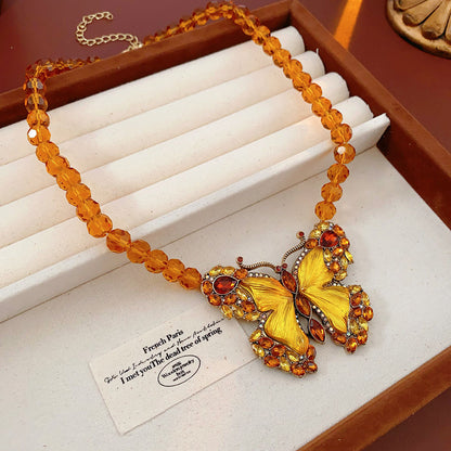 Golden Butterfly Statement Necklace with Amber Beads