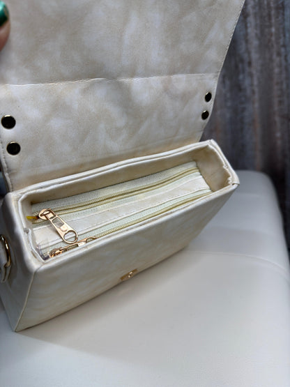 Elegant Cream Top-Handle Handbag with Distinctive Gold Clasp