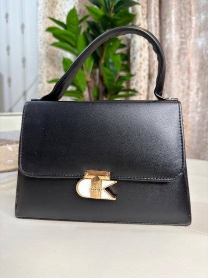 Elegant Cream Top-Handle Handbag with Distinctive Gold Clasp