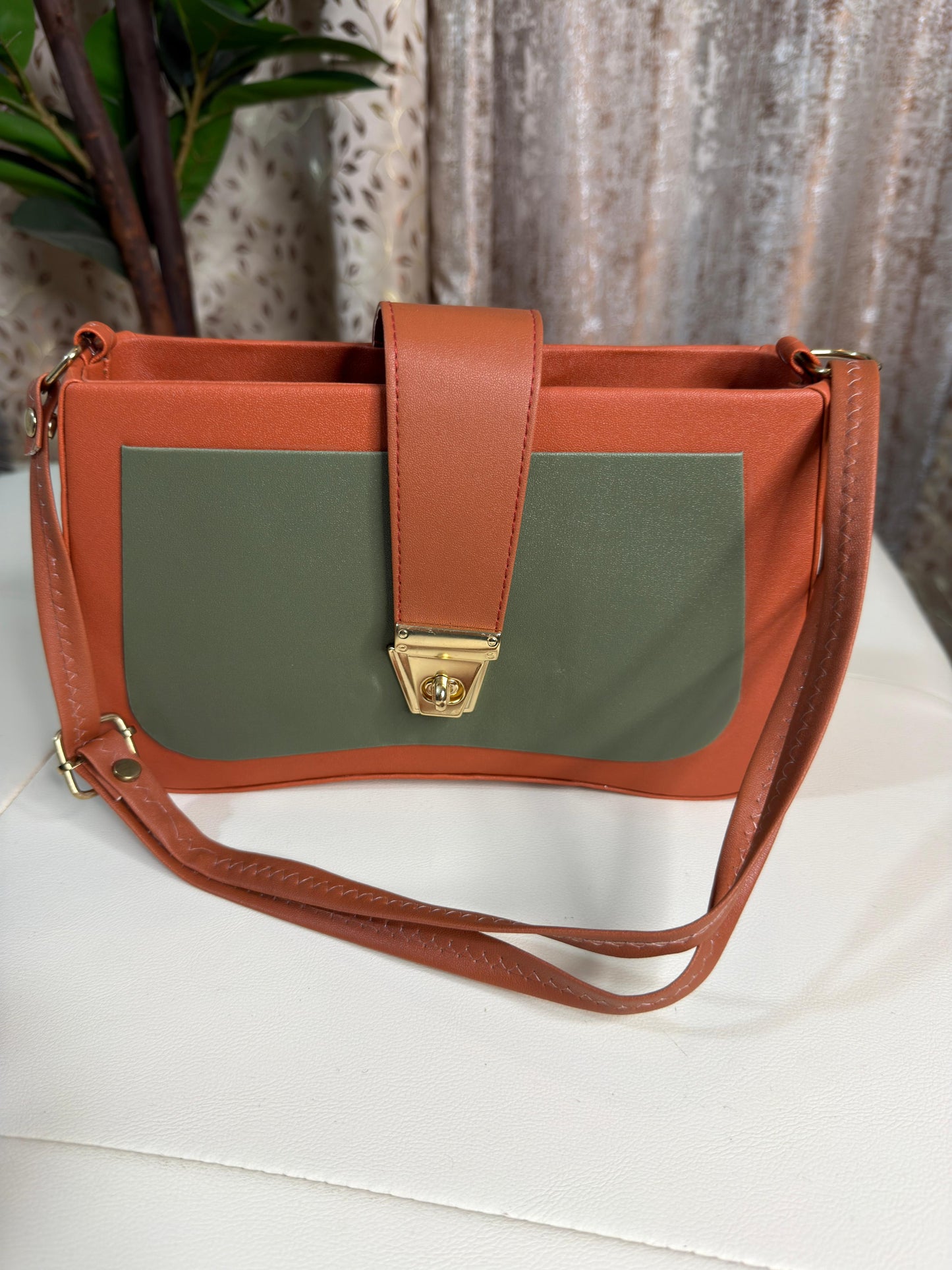 Chic Two-Tone Crossbody Bag with Gold-Tone Clasp