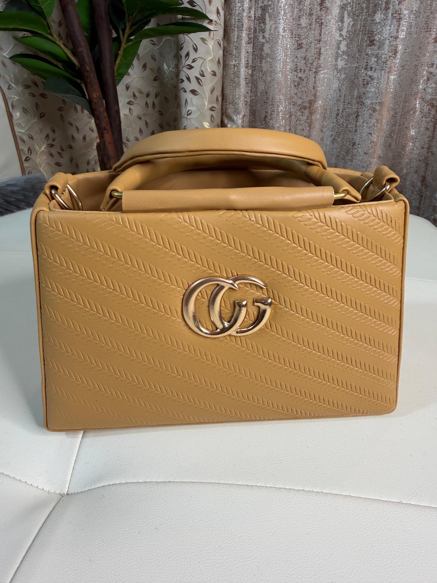Chic Tan Chevron Quilted Handbag with Gold Interlocking Logo