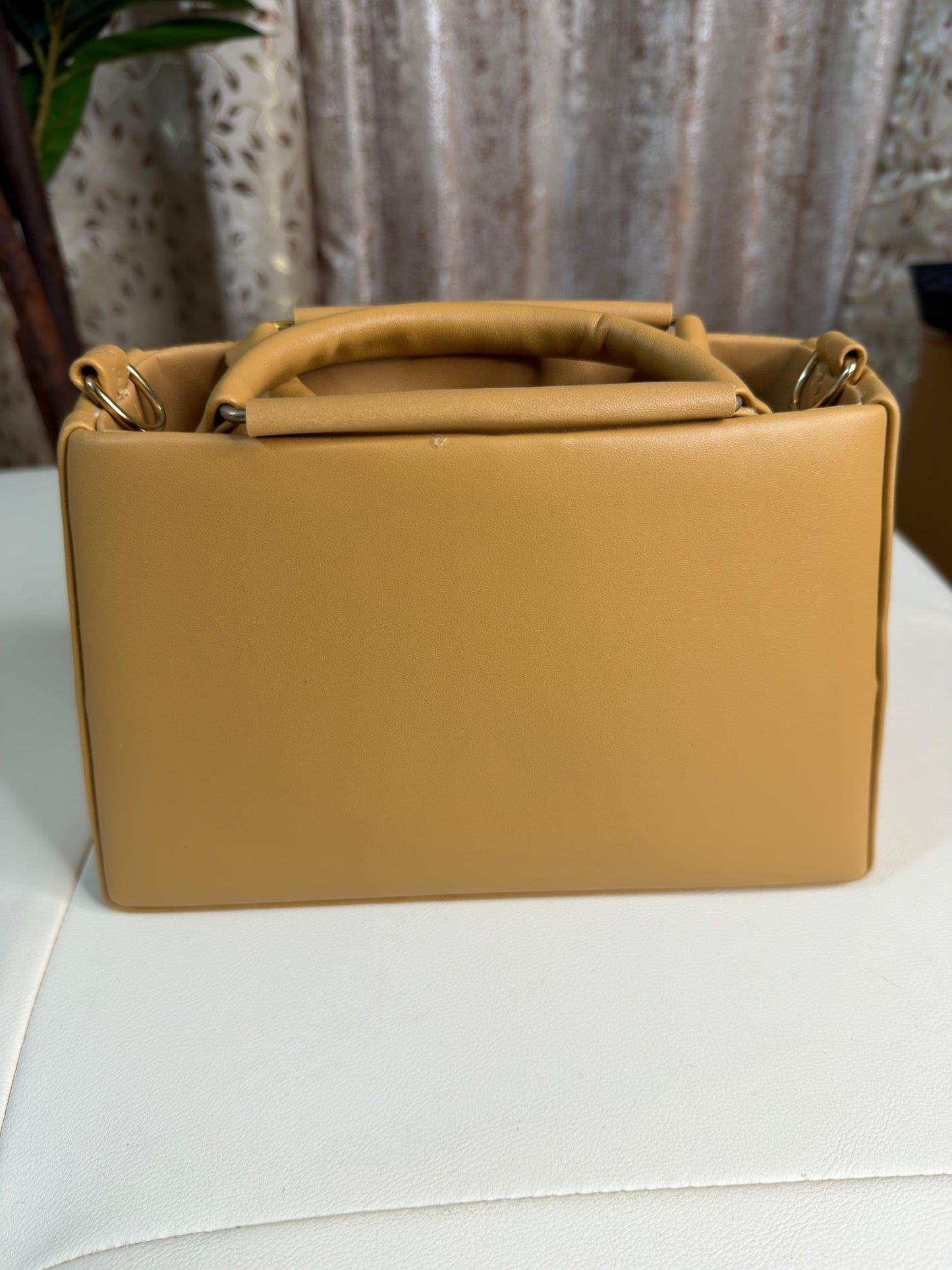 Chic Tan Chevron Quilted Handbag with Gold Interlocking Logo