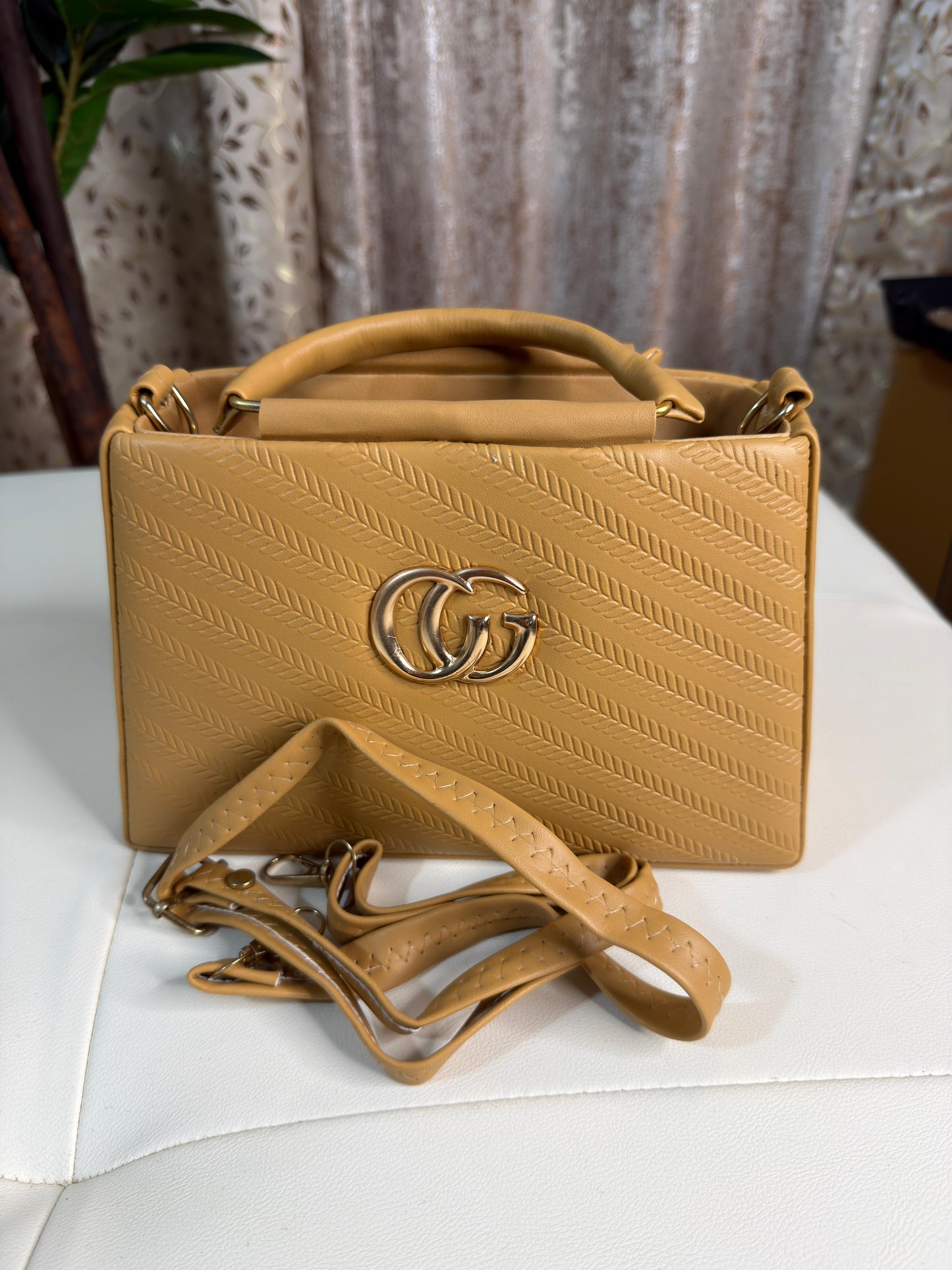 Chic Tan Chevron Quilted Handbag with Gold Interlocking Logo