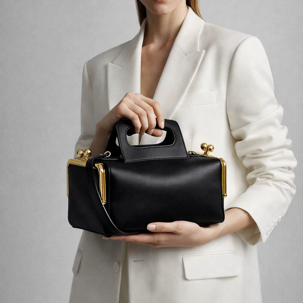 Elegant Black Leather Frame Bag with Gold Clasp