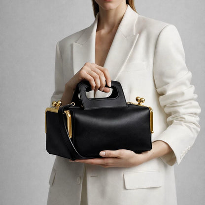 Elegant Black Leather Frame Bag with Gold Clasp