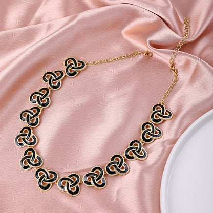Elegant Gold-Tone Black Enamel Celtic Knot Necklace
