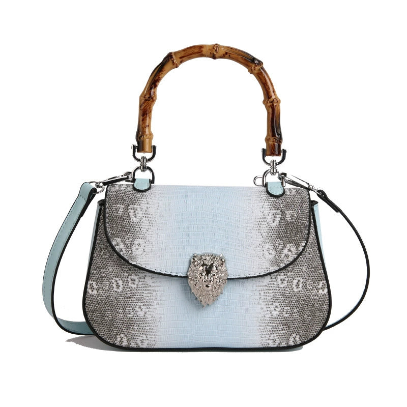 Chic Snake Print Crossbody Bag with Bamboo Handle & Lion Clasp