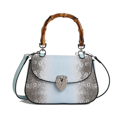 Chic Snake Print Crossbody Bag with Bamboo Handle & Lion Clasp