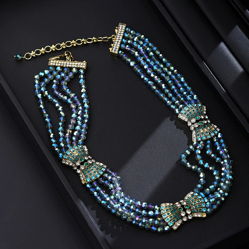 Ornate Multi-Strand Blue Crystal & Emerald Statement Necklace and Earrings