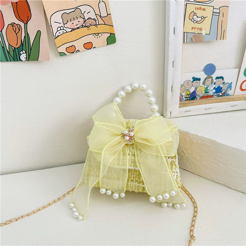 Chic Pink Tweed Mini Handbag with Pearl Handle & Bow