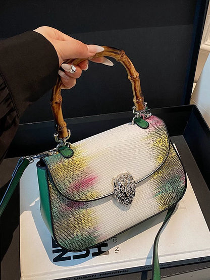 Chic Snake Print Crossbody Bag with Bamboo Handle & Lion Clasp