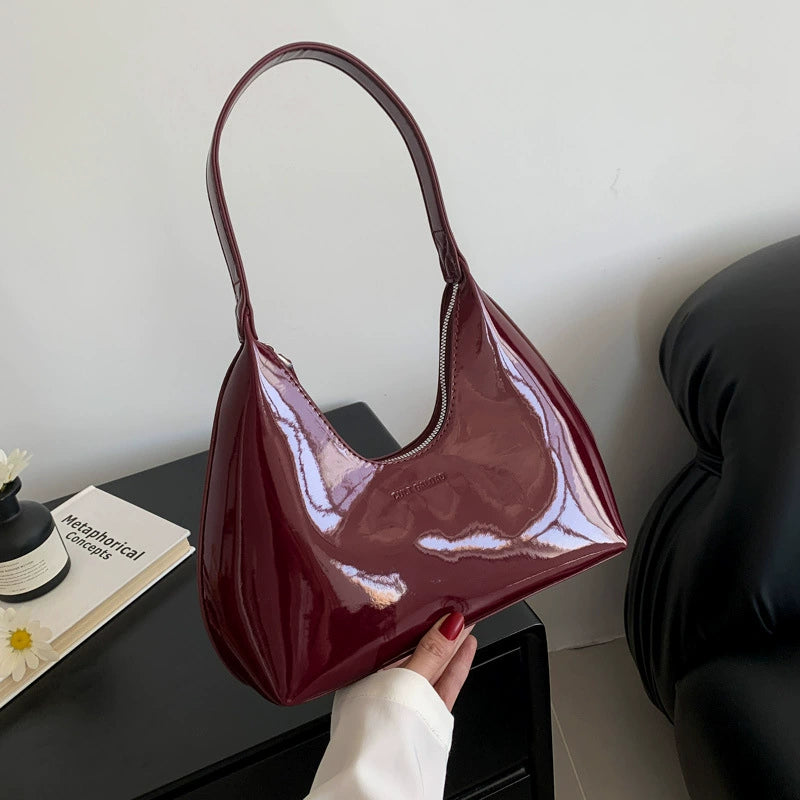 Elegant Cream Patent Leather Crescent Shoulder Bag