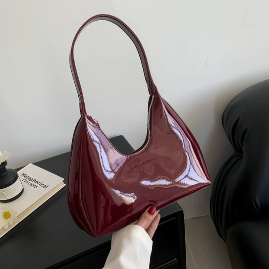 Elegant Cream Patent Leather Crescent Shoulder Bag