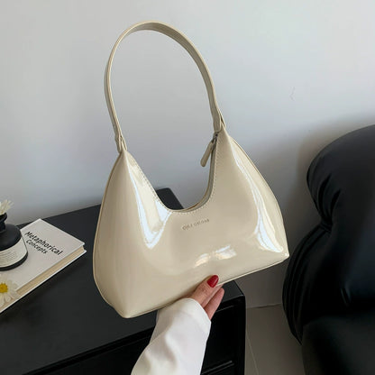 Elegant Cream Patent Leather Crescent Shoulder Bag