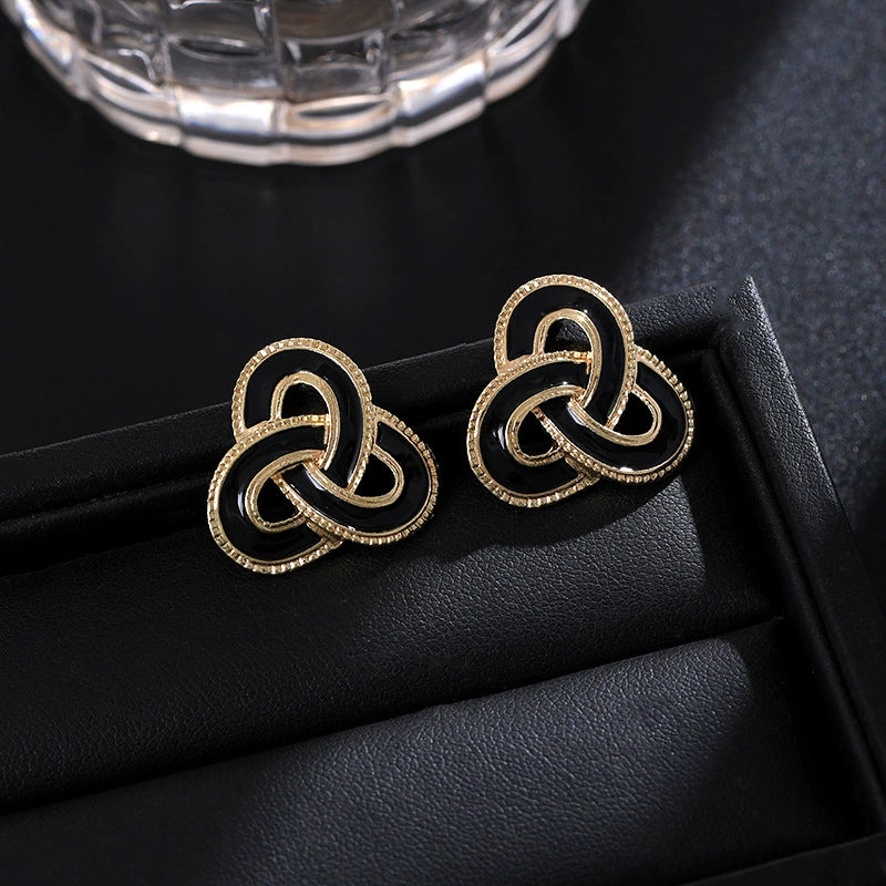 Elegant Gold-Tone Black Enamel Celtic Knot Necklace