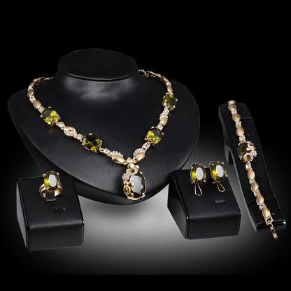 Jewelry set with necklace, earrings, and bracelet on a black background
