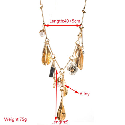 Artisan Multi-Charm Statement Necklace with Pearls