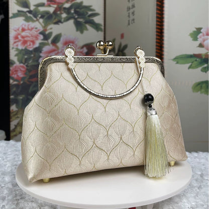 Elegant Embroidered Silk Clutch Bag with Vintage Kiss-Lock Frame