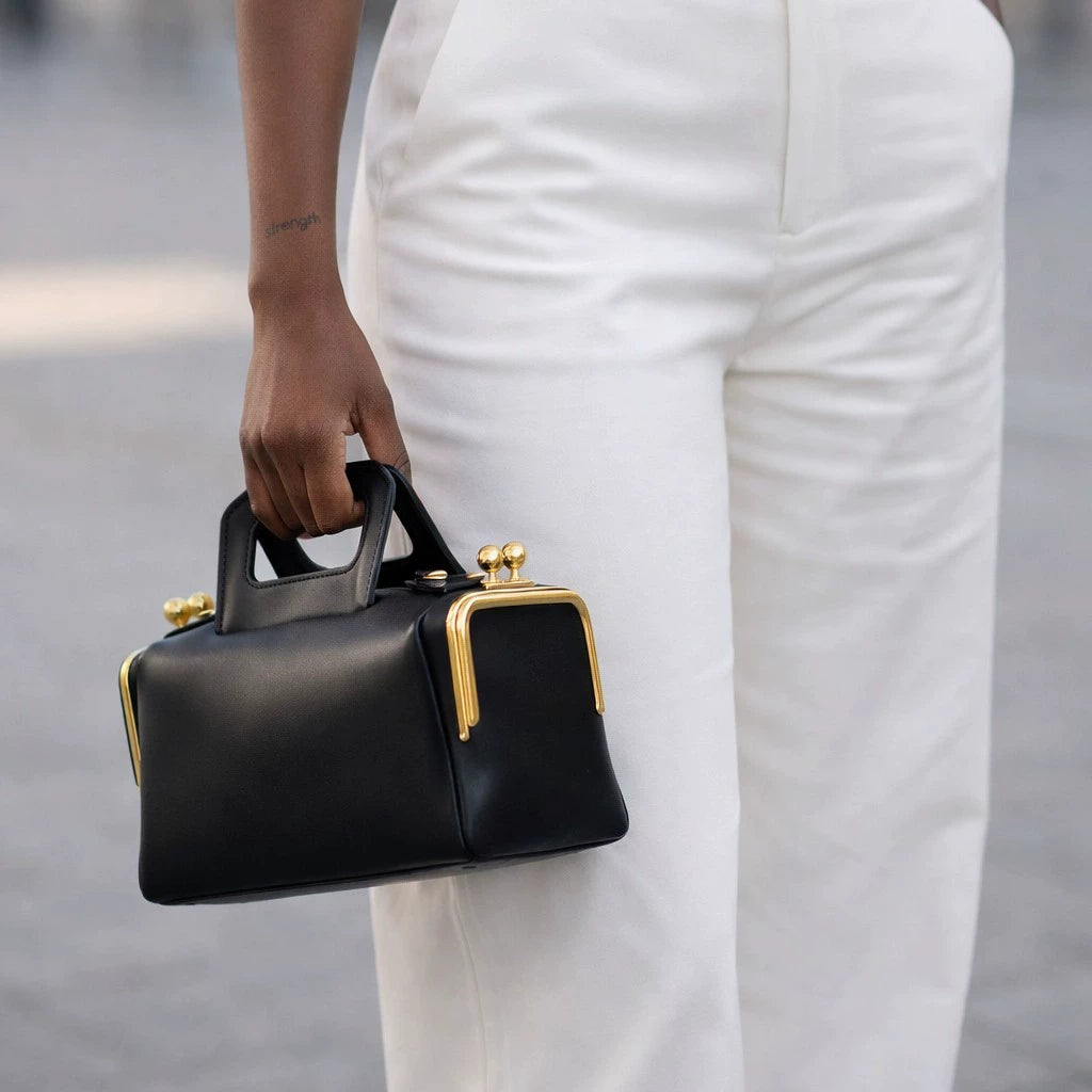 Elegant Black Leather Frame Bag with Gold Clasp