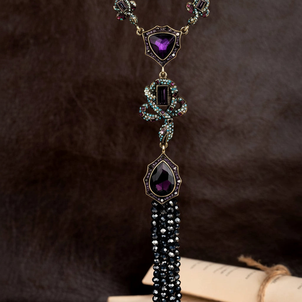 Decorative necklace with purple gemstones on a dark background