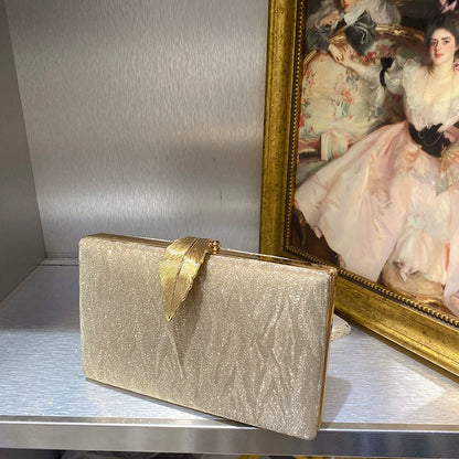 Elegant Shimmer Evening Clutch Bag with Gold Leaf Clasp