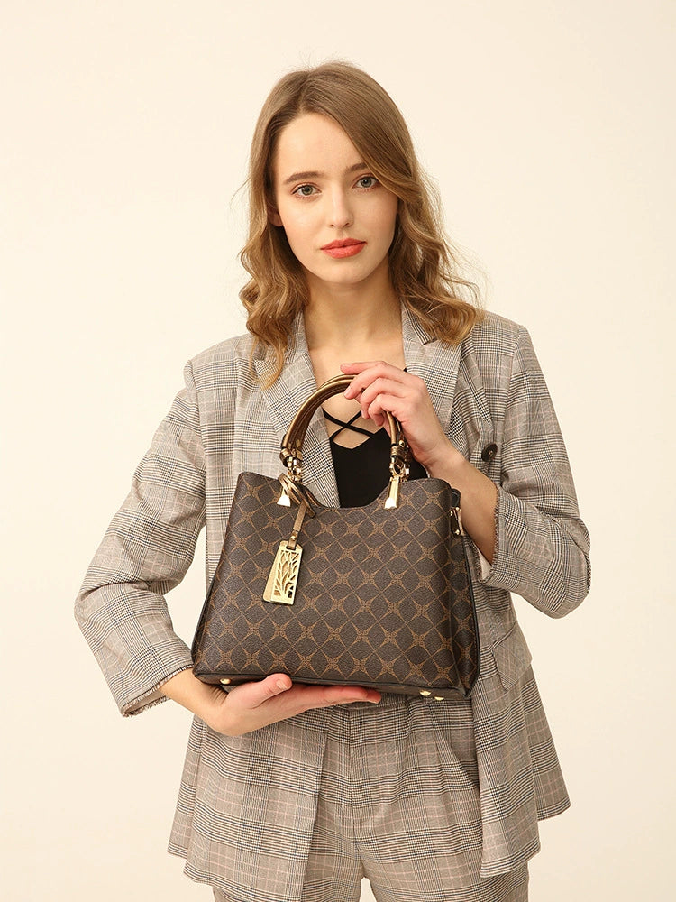 Elegant Brown Monogram Tote Bag with Gold Charm