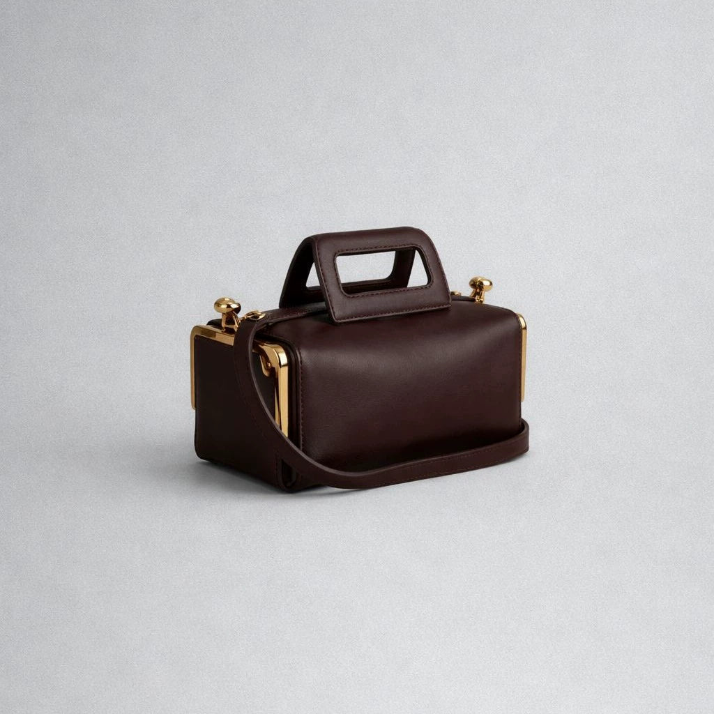Elegant Black Leather Frame Bag with Gold Clasp