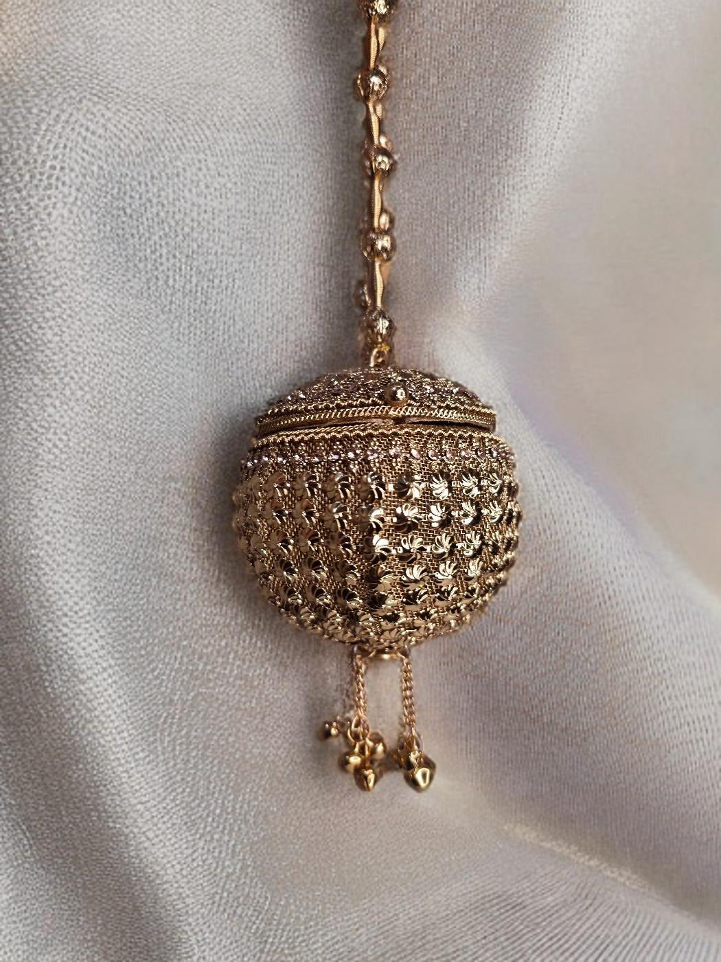 Small sized gold Noor Potli round