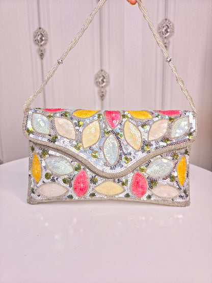 Party wear Multi coloured leaves designed stone embroidered clutch