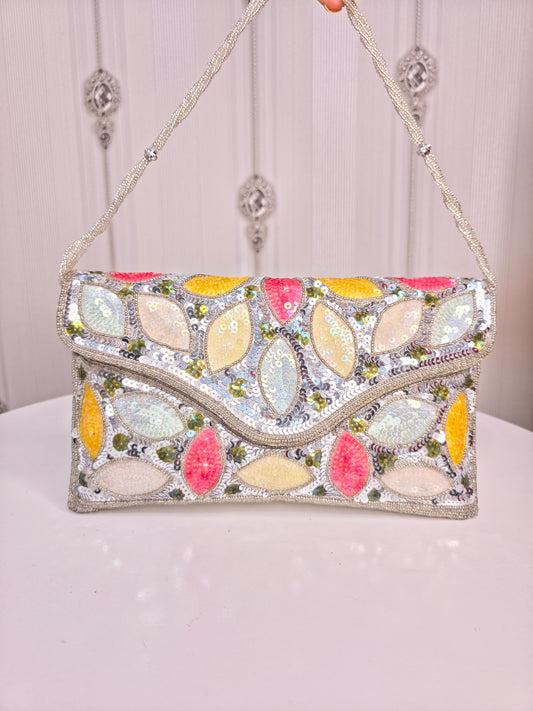 Party wear Multi coloured leaves designed stone embroidered clutch